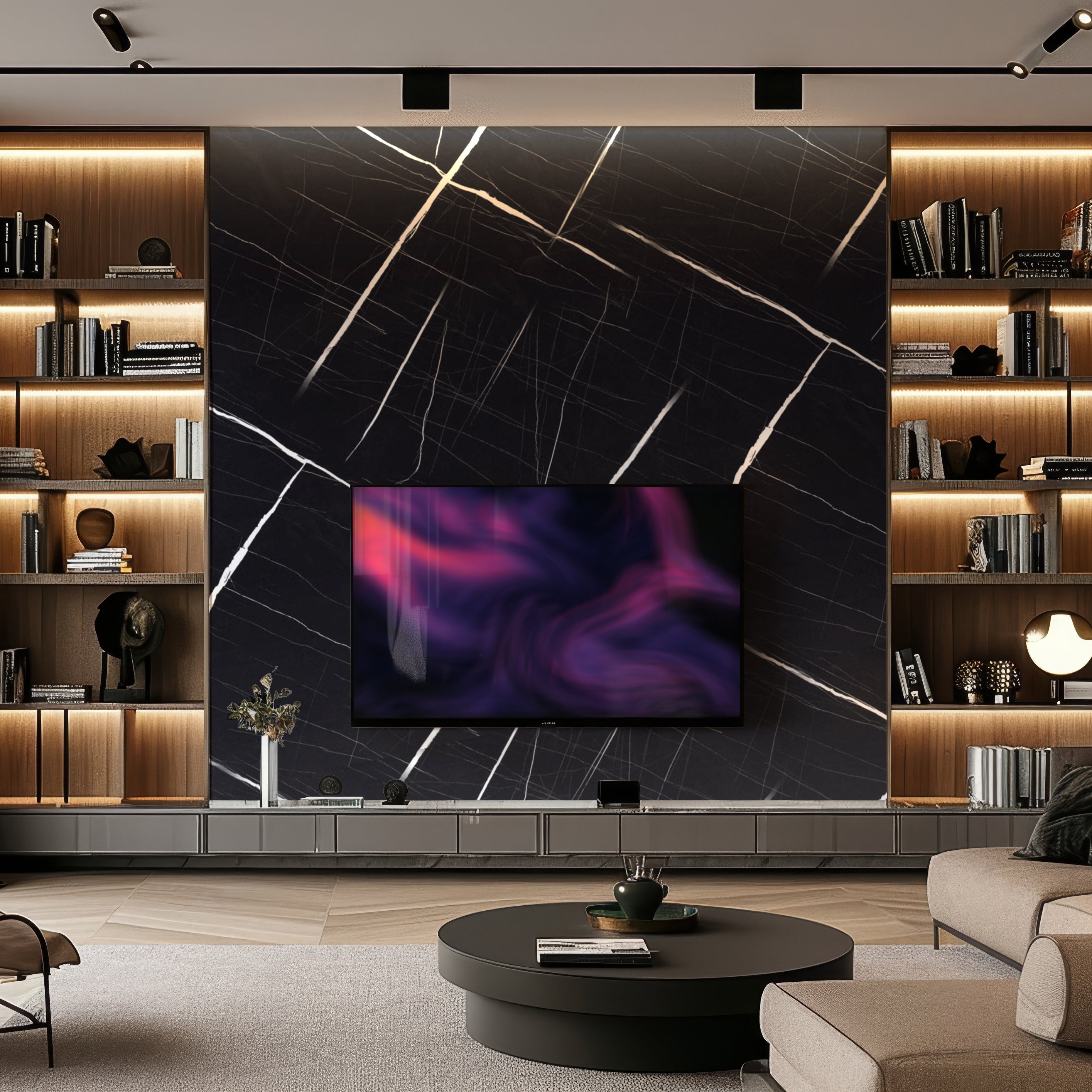 Modern living room with built-in bookshelves, featuring Landmark Decor's Noir Frost Marble Durable PVC Wall as a bold black marble accent, a flat-screen TV, and a round black coffee table in the center.