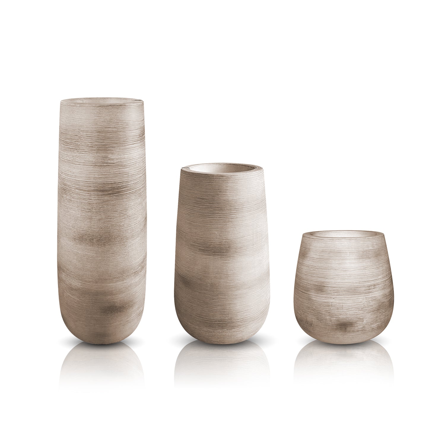 The Artisan Luxe Planter - Full Set by Landmark Decor features three textured, beige vases in a row against a white backdrop. Handcrafted for luxury, the tallest is on the left, the medium in the center, and the shortest on the right—all with a smooth matte finish exuding nature’s elegance.
