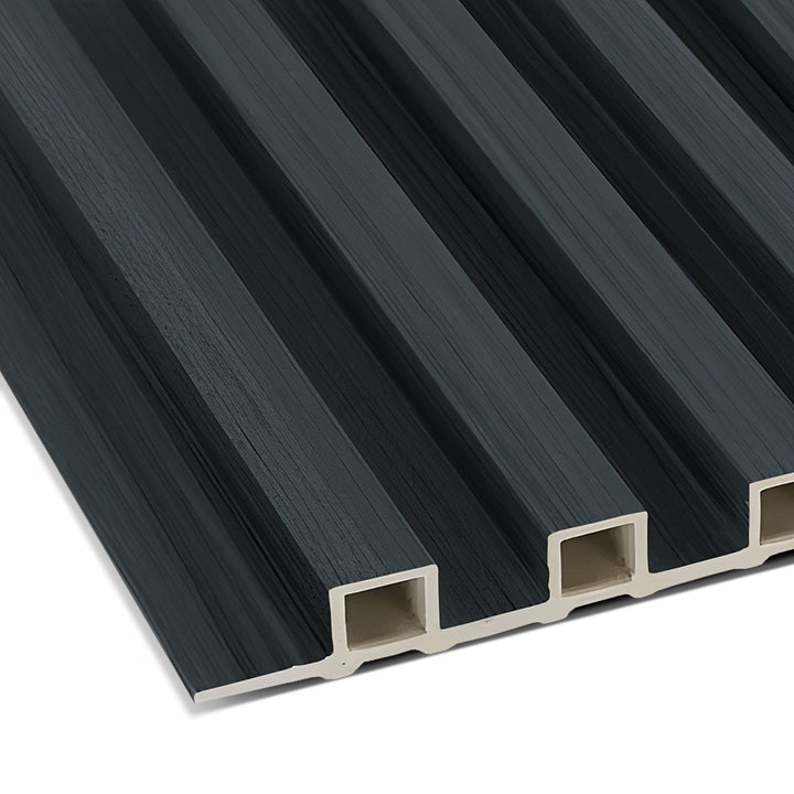 Close-up of the Landmark Decor Space Gray WPC Fluted Slat Wall Panel, a black rectangular board with five parallel grooves and open ends, perfect for use as acoustic panels or stylish accent wall features.